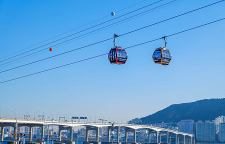 Songdo Skywalk and gondola are popular tourist attractions in Busan,South Koreaの写真素材