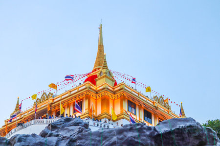 Golden buddha, red background, Wat Saket, Bangkok, Thailand