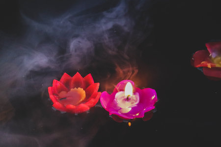 Floating lotus candle , The flame on the lotus flowerの写真素材