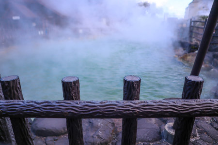 Mysterious Natural Hot Spring with Thick Vapor and Tranquil Water Surface