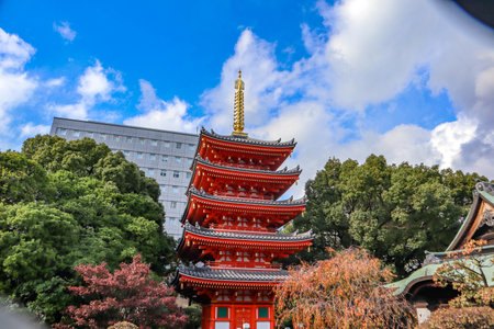 Red pagoda and blue sky in Autumn.の写真素材