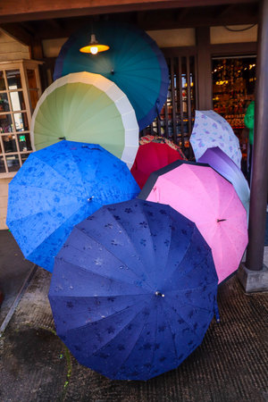 Close-Up of Wet Umbrellas After Rainfall in Cityの写真素材