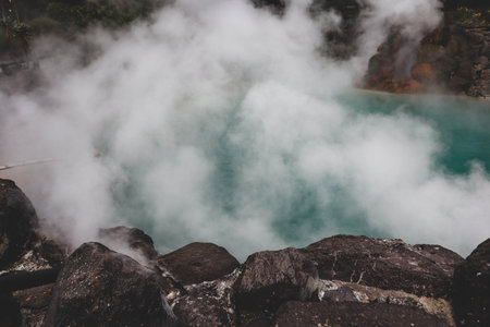 Steaming Hot Spring in Beppu, Japan, Natural Geothermal Spa in Outdoor Setting
