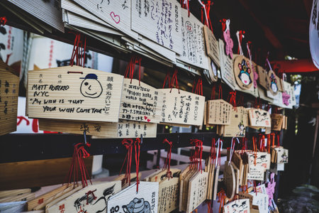 Wood boards with prayers and wishes written on it hangingの写真素材