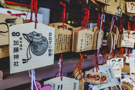 Traditional Japanese Ema Boards Hung at Shrine for Wishes and Prayersの写真素材