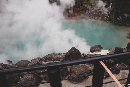 Steaming Hot Spring in Beppu, Japan, Natural Geothermal Spa in Outdoor Settingの写真素材