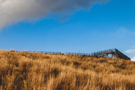 Scenic Grassland Hill with Cloudy Sky in Aso Mountain Japan