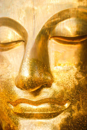 golden buddha statue close eyesの写真素材