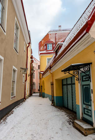 Tallinn, Estonia - March 12, 2019: Narrow street in the old town with color housesのeditorial素材