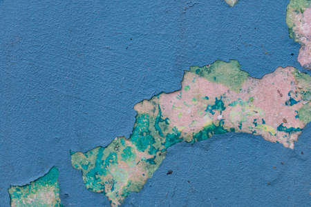 Vintage wall texture. Grunge background with blue speckled paint on concreteの写真素材