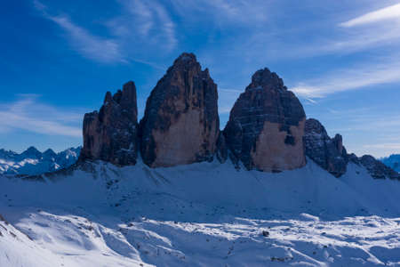 Tre Cime Di Lavaredo. The Three Peaks on Sunny Day in Winter. Aerial View. Sexten Dolomites, South Tyrol. Italy. View from the North.の写真素材