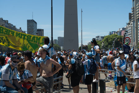 BUENOS AIRES, ARGENTINA - DECEMBER 20, 2022: People on the streets during Celebration of Argentina National Football Team Victory in FIFA World Cup Qatar 2022.のeditorial素材