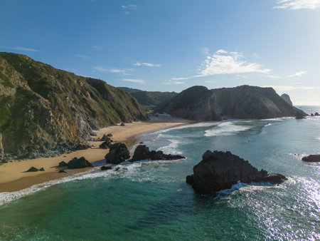 Adraga Beach and Cliffs on Sunny Day. Atlantic Ocean, Portugal. Aerial View.の写真素材