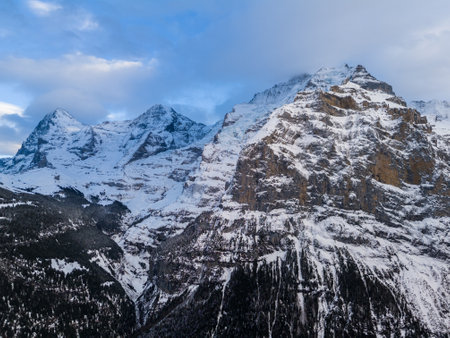 Eiger, Monch and Silberhorn Mountains in Winter. Swiss Alps. Switzerland. Aerial View