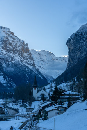 Lauterbrunnen Valley and Snowy Mountains in Winter Morning. Swiss Alps. Switzerlandの写真素材