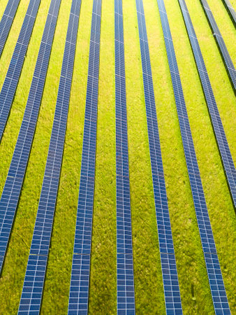 Photovoltaic Solar Panels in Green Field in Portugal. Aerial View