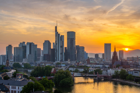 Frankfurt Downtown Skyscrapers, Residential Buildings, Bridges and Main River at Fiery Sunset. Aerial View. Golden Hour. Hesse, Germanyの写真素材