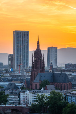 Frankfurt Cathedral, Residential Buildings and City at Fiery Sunset. Gothic Church. Aerial View. Golden Hour. Hesse, Germanyの写真素材