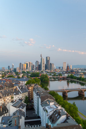 Frankfurt City Downtown, Residential Buildings, Bridges and Main River at Sunrise. Wide Shot. Aerial View. Hesse, Germanyの写真素材