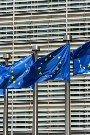 European Union Blue Flags and Berlaymont Building, Headquarters of the European Commission. City of Brussels, Belgiumの写真素材