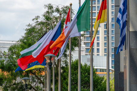 European Union Countries Flags and Green Trees in City of Brussels, Belgium