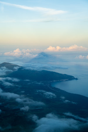 Long Shadow of Mount Pico and Clouds in Evening. Atlantic Ocean. Pico Island, Azores. Portugalの写真素材