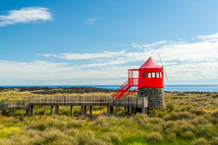 Moinho do Juncal Red Windmill and Atlantic Ocean. Lajes, Pico Island, Azores. Portugalの写真素材