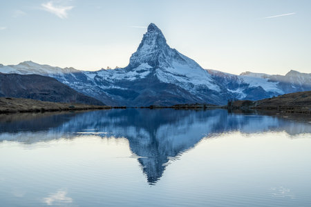 Matterhorn Mountain and Reflection in Lake Stellisee in Evening. Swiss Alps. Valais, Switzerlandの写真素材