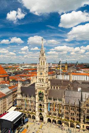 New Town Hall on Sunny Summer Day. Tourists on Marienplatz. Munich Skyline. Bavaria, Germany. View from Tower of Alter Peterの写真素材