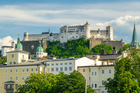 Salzburg Old Town and Hohensalzburg Fortress on Sunny Summer Day. Salzach River. Austria. Medium Shotの写真素材