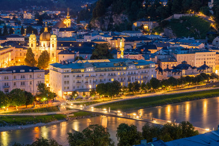 Illuminated Salzburg Old Town at Summer Night. Salzach River. Austriaの写真素材
