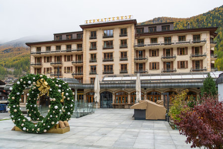 ZERMATT, SWITZERLAND - OCTOBER 20, 2025: Closed Grand Hotel Zermatterhof in Autumn on Cloudy Day. Zermatt, Valais, Switzerlandのeditorial素材