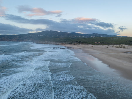 Guincho Beach and Green Mountains of Sintra on Cloudy Evening. Aerial View. Atlantic Ocean, Portugalの写真素材
