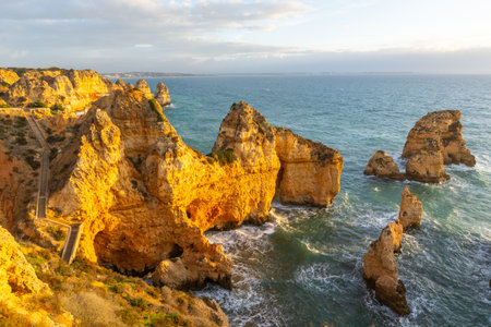 Ponta da Piedade Rock Formations, Cliffs and Atlantic Ocean on Sunny Morning. Algarve, Portugalの写真素材