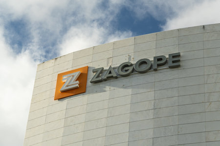 OEIRAS, PORTUGAL - JANUARY 10, 2026: Zagope Sign on Office Building in Lagoas Park against Blue Sky....
