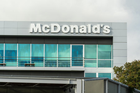 OEIRAS, PORTUGAL - JANUARY 10, 2026: McDonalds Corporation Sign on Office Building in Lagoas...