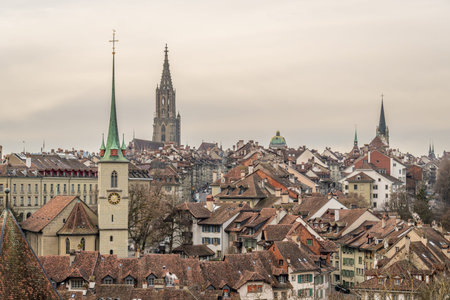 Cityscape of Bern Old Town on Cloudy Day. Berner Munster Cathedral. Switzerland
