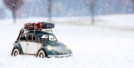 Model of Volksvagen Beetle tin photographed in a winter contextのeditorial素材