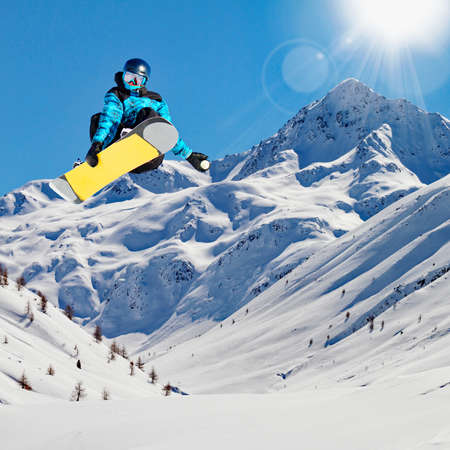 jump in the Alps with snowboardの写真素材