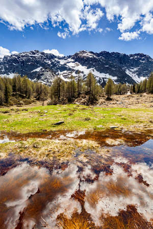 MufulÃ¨ pond - thaw - Valmalenco (IT)の写真素材