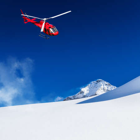 heli ski in fly over the alpsの写真素材