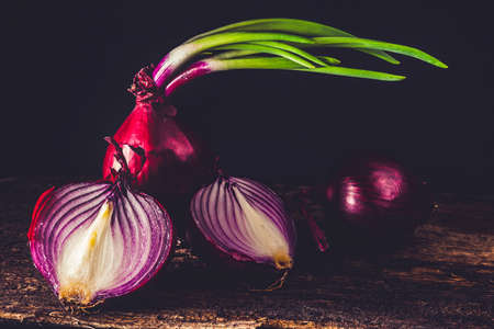 red onion with sprout - close upの写真素材