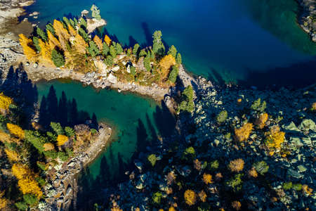 Val di Campo - Engadina (CH) - Autumnal aerial view of the Viola lakeの写真素材