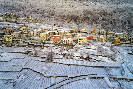 Valtellina (IT), Panoramic winter aerial view of Sant 'Anna in Sondrioの写真素材