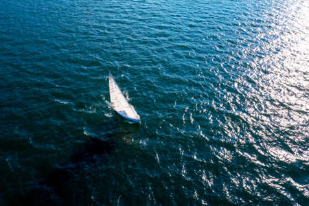 Sailing boat at sea, aerial viewの写真素材