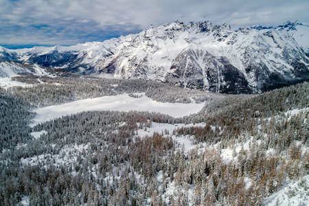PalÃ¹ Lake, Valmalenco (IT), Winter aerial view with fresh snowの写真素材