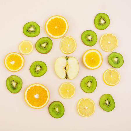 Fruit texture. Background of various sliced fruits