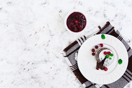 Chocolate fondant with cranberry sauce. Top viewの写真素材