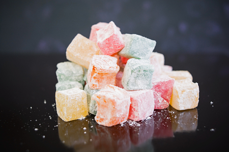 Turkish delights lokum on dark backgroundの写真素材