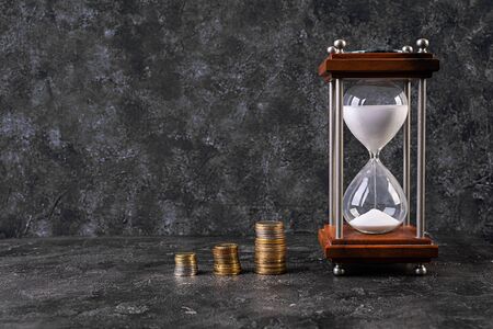 Money, coin, time saver. Business concept. Crisis, devaluation, save money.